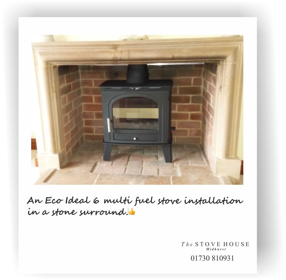 An Eco Ideal 6 in a stone surround, supplied & Installed by The Stove House