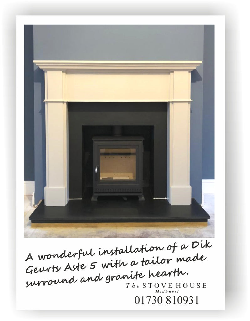 Dik Geurts Aste 5 Low Woodburning in a Bespoke Winterfold Timber Mantle with Cambridge Clay painted finish and honed black granite