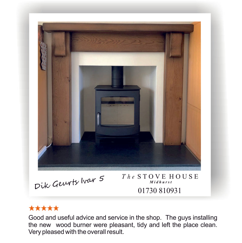 Dik Geurts Ivar 5 wood burner installation with solid oak fireplace surround and slate hearth