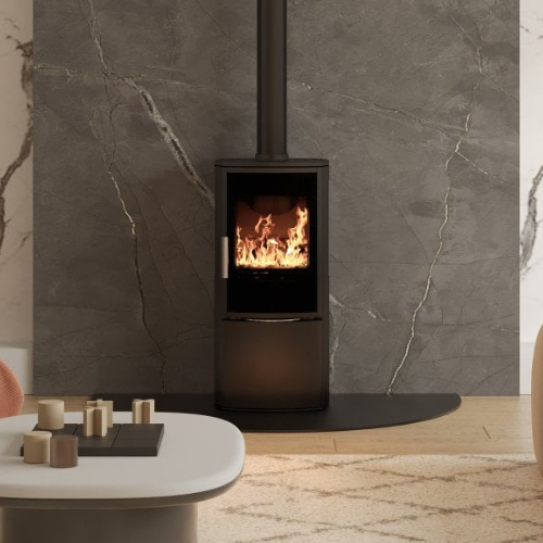 ACR Neo XC Wood Stove. With its sleek black glass door, clean lines, and bold, minimalist form, this Eco Design ready and Defra approved 5kW stove adds more than just heat to your home at The Stove House Ltd. West Sussex.