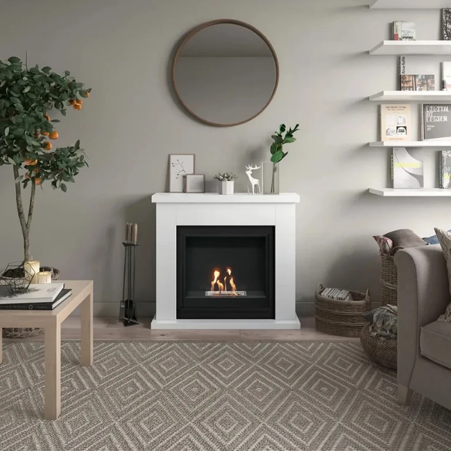 Frode Bioethanol Fireplace Suite - White. Crafted from MDF with a sleek white finish and a 2-litre capacity, providing up to 6 hours of burn time and a heat output of 3 kW, at The Stove House Ltd. West Sussex