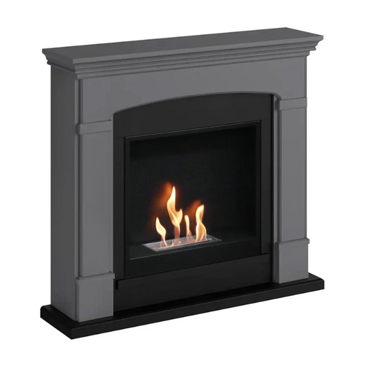 Helmi Bioethanol Fireplace Suite - Grey. Crafted from MDF with a classic grey finish, the Helmi fireplace is equipped with a bioethanol burner with a capacity of 2 litres, providing up to 5-6 hours of burn time and a heat output of up to 3 kW, at The Stove House Ltd. West Sussex.