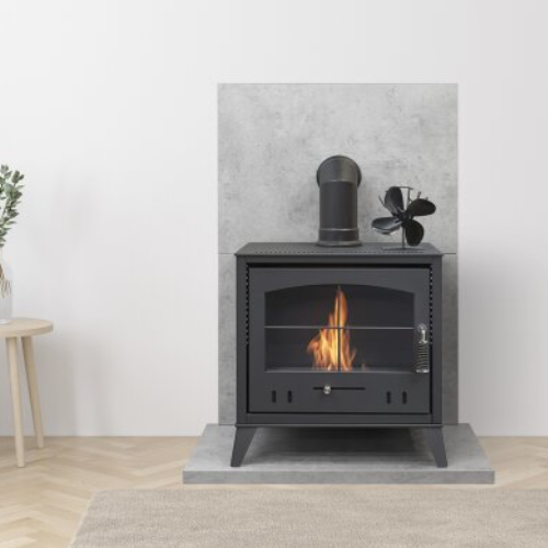 OKO heat-powered stove fan is in black stands at just 199 mm tall. No batteries or external power required, and it circulates the warm air around your room at The Stove House Ltd. West Sussex.