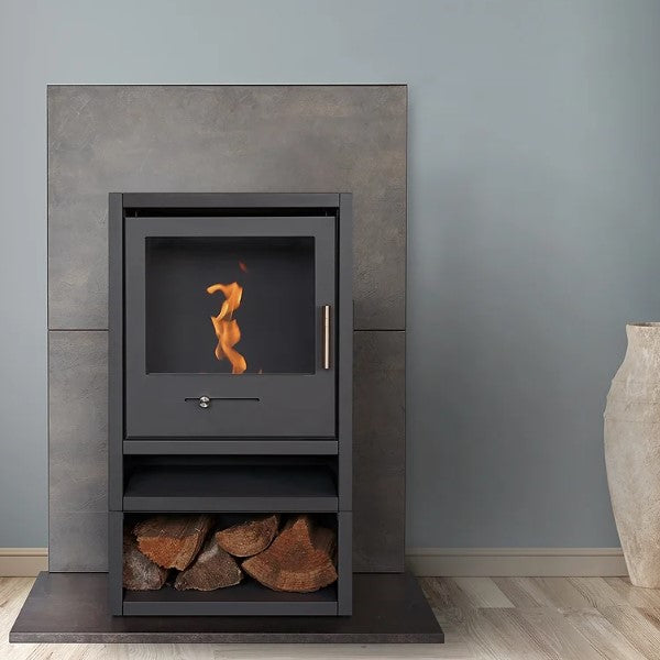 OKO S1 Freestanding Bioethanol Stove with Log Store & Flue Pipe in Charcoal Grey requires no flue/chimney at the Stove House Ltd. West Sussex.