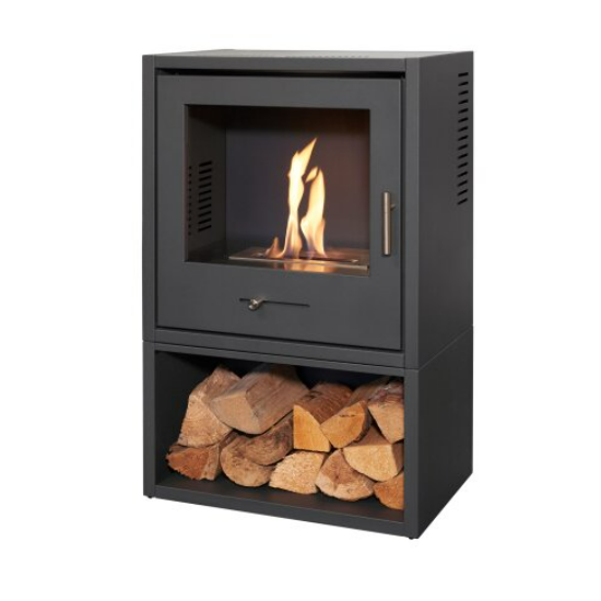 Black freestanding fireplace with fire burning inside and wood stacked below on a white background