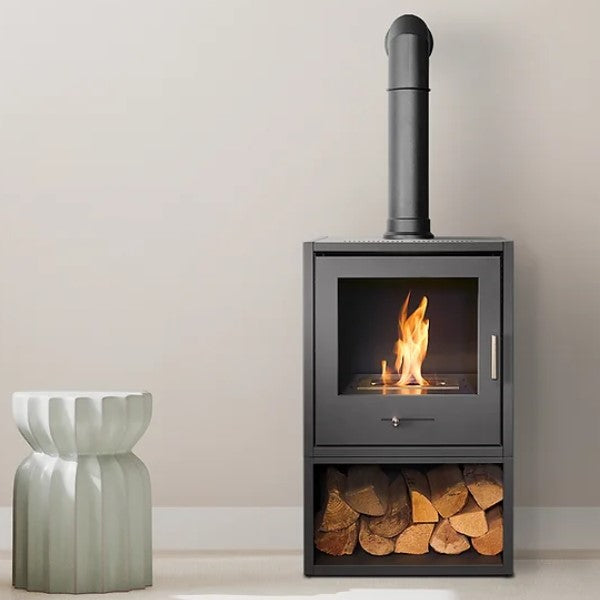 A grey box like structure made of steel that has a metal chamber inside that houses BIOETHANOL fuel. A 100% eco friendly renewable energy resource that's been turned into liquid. This is put into the metal chamber inside the fire box and lite to produce real flames and real heat and no chimney is required.