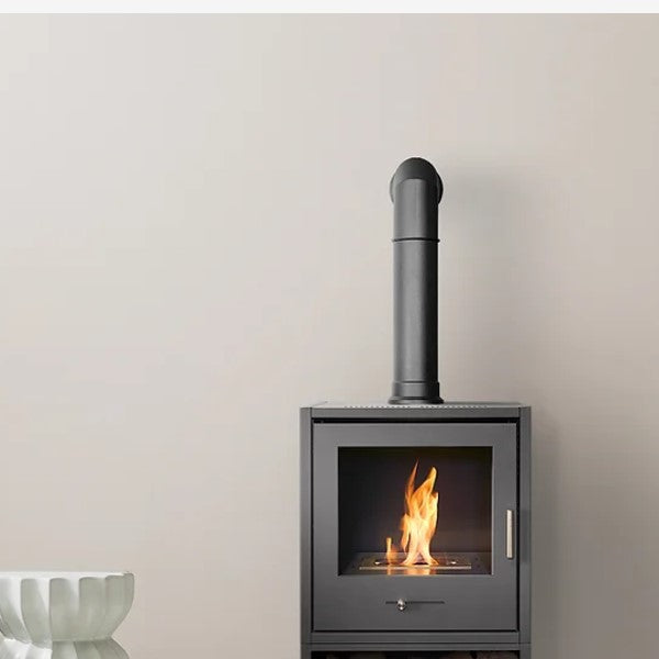 OKO S3  BLACK BIOETHANOL STOVE £498.99 Free UK delivery. Medium bio ethanol fluless fire 3kW heat. Shown with a short angled faux flue pipe sitting on the top for a realistic effect