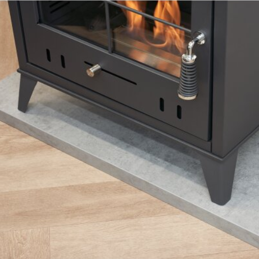 An OKO S4 BIOETHANOL STOVE £483.99 that burns Bio ethanol fuel. Its a flueless traditional woodburner style fire with a large glass door and tacery on it. The flames produce 3kW in heat and looks very cosy and inviting. It has No chimney or flue as one isn't needed and its from The Stove House