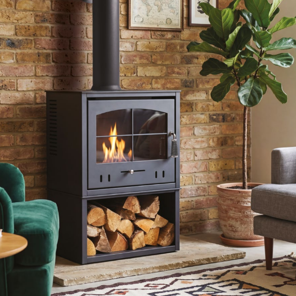 OKO S4 BIOETHANOL STOVE WITH LOG STORE. A larger bioethanol stove with a broader, more substantial presence and traditional design in charcoal grey. Up to 3 kW output at The Stove House Ltd. West Sussex.