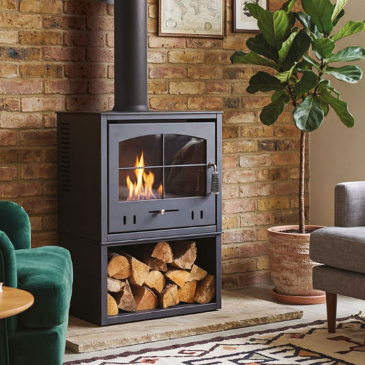 OKO S4 BIOETHANOL STOVE WITH LOG STORE. A larger bioethanol stove with a broader, more substantial presence and traditional design in charcoal grey. Up to 3 kW output at The Stove House Ltd. West Sussex.
