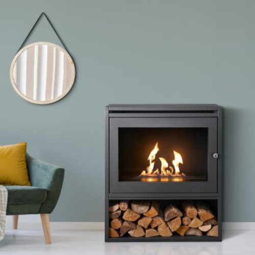 OKO S6 with Log Store - Modern Freestanding Bioethanol Stove in Charcoal Grey that burns eco fuel, which means it doesn't need a chimney at The Stove House Ltd. West Sussex.