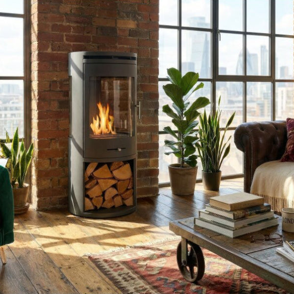 The OKO S7 bio ethanol panoramic stove in charcoal grey offers the brilliance of a real, open flame system for up to 8 hours. A heat output of up to 3kW. No direct flue or chimney required at The Stove House Ltd. West Sussex.