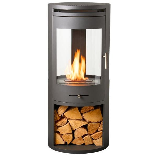 The OKO S7 bio ethanol panoramic stove in charcoal grey offers the brilliance of a real, open flame system for up to 8 hours. A heat output of up to 3kW. No direct flue or chimney required at The Stove House Ltd. West Sussex.