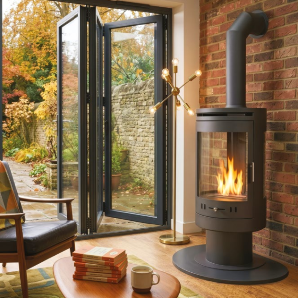 OKO S9 - Large Modern Freestanding Cylindrical Bioethanol Stove in Charcoal Grey that burns eco fuel, which means it doesn't need a chimney at The Stove House Ltd. West Sussex.