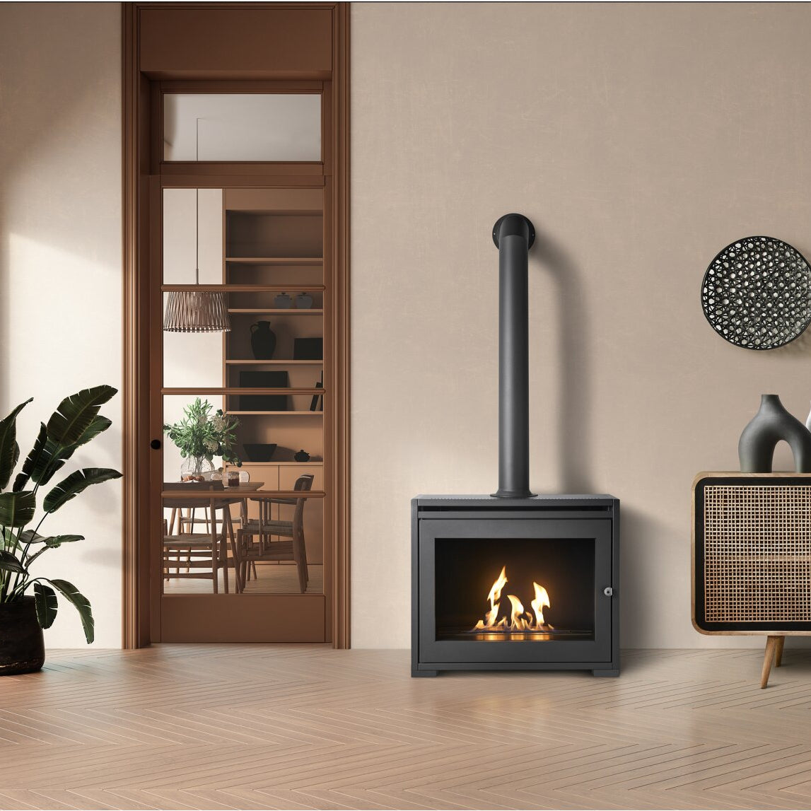 An Oko S6 stove with flue pipe option; A tall grey tube made of metal that sits ontop of a grey box like structure made of steel that has a metal chamber inside that houses BIOETHANOL fuel and you ignite and it produces heat. A 100% eco friendly renewable energy resource that's been turned into liquid. This is put into the metal chamber inside the fire box and lite to produce real flames and real heat and no chimney is required. 