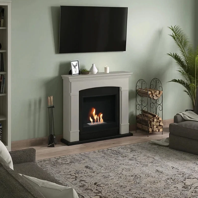 Helmi Bioethanol Fireplace Suite - Beige. Crafted from MDF with a classic beige finish, the Helmi fireplace is equipped with a bioethanol burner with a capacity of 2 litres, providing up to 5-6 hours of burn time and a heat output of up to 3 kW, at The Stove House Ltd. West Sussex.