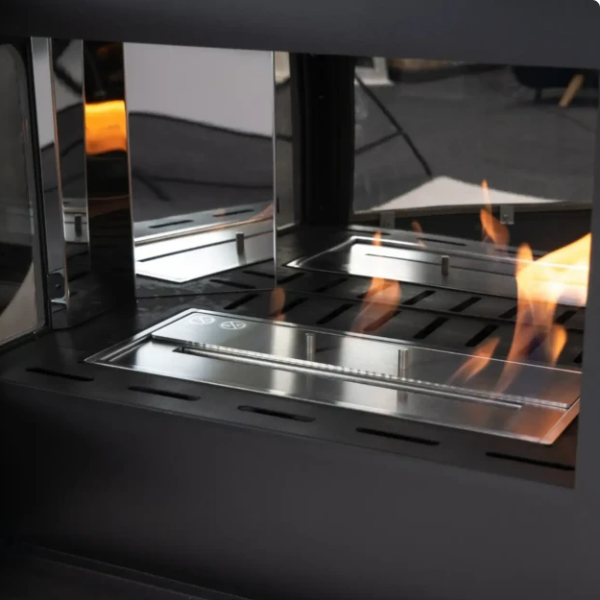 Victoria 85 Freestanding Cast Iron Bioethanol Stove. An elegant freestanding bioethanol fireplace with a 3-sided view of panoramic flames without the need for a chimney, at The Stove House Ltd. West Sussex.